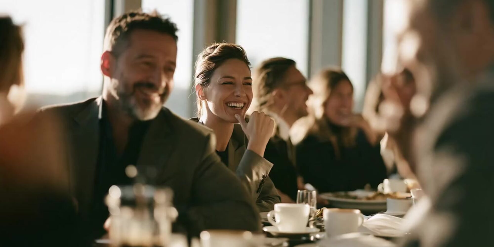 Pharma leaders laughing at a breakfast working session in Istanbul